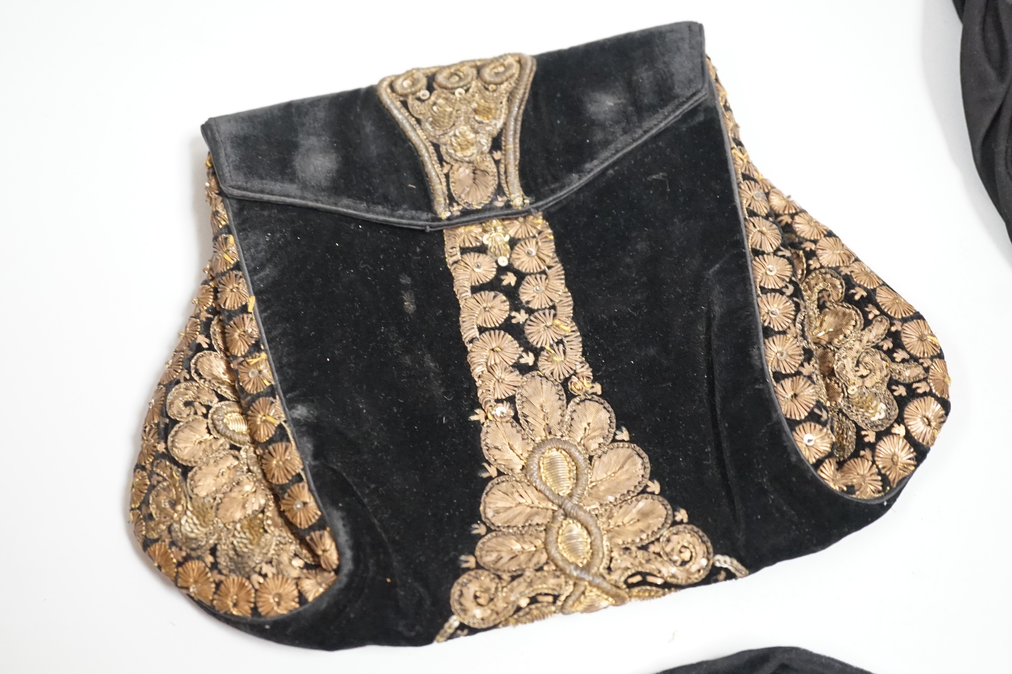 A 1930’s evening bag with silver frame, seven 1930’s-40’s evening bags with diamante encrusted Bakelite frames and clasps, a costume jewelled bag and two gilt and sequin bags